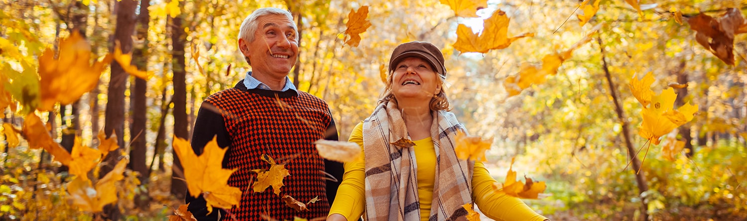 Seniors in park in Autumn