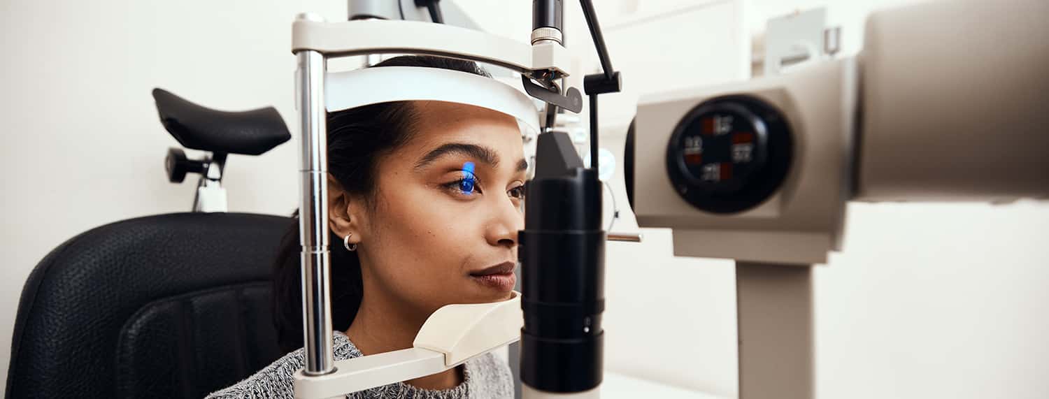 Woman having eye exam
